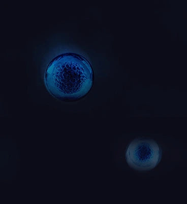 Blue glowing cells on a black background