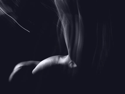 Silhouette of an athlete on a dark background