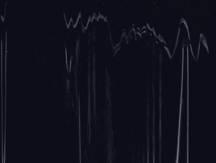 Abstract black and white pattern on a dark background