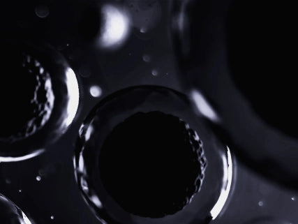 Close-up of a metallic object with reflective surfaces